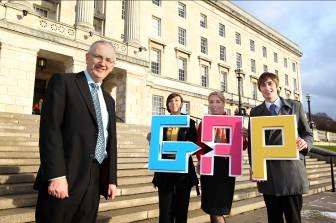 DEL Minister Danny Kennedy welcomes University of Ulster graduates Claire McCabe and Christopher Maitland to Stormont.  Lynne Tinkler, GAP Programme Manager, Business in the Community, is third left in the group.