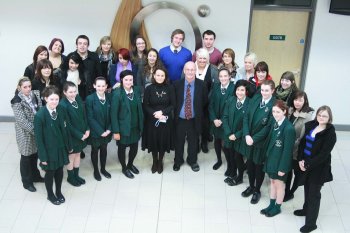 University of Ulster's Dr Roger Austin (centre) with his students alongside pupils and staff from St Cecilia's College in Derry.