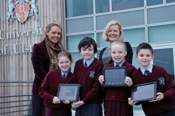 Shauna McGill, School of Education and Rachel Doherty, St John's ICT Co-ordinator, with St John's PS pupils Leah Irwin, Bailey Nelis, Eimear McColgan and Caoimhim O'Neill