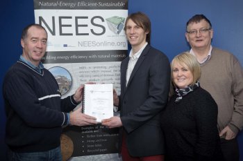 Director of Academic Enterprise, Dr Norry McBride (left) is presented with findings from the APPG report by the University of Ulster’s transnational research team - (left to right) Stuart Thompson, Dr Elaine Ramsey and Derek Bond.