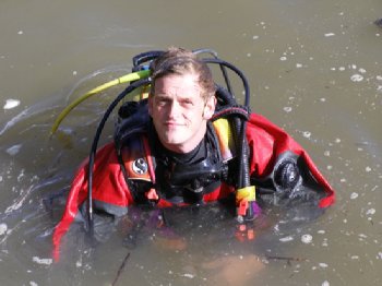 Rory McNeary, from the Centre for Maritime Archaeology at Coleraine, taking part in the underwater excavation in the River Drava